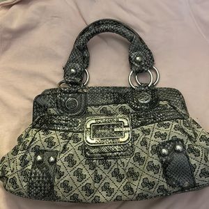This is my guess purse, brand new never used.